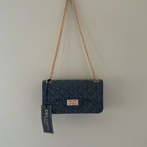 gray shoulder/cross body bag on gold chain